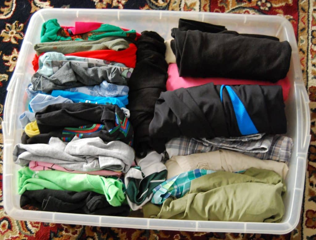 How Do You Pack Clothes For Family Camping?