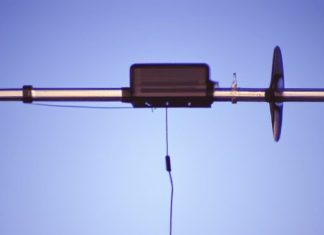 how do you perform a weekly radio check on the emergency radio